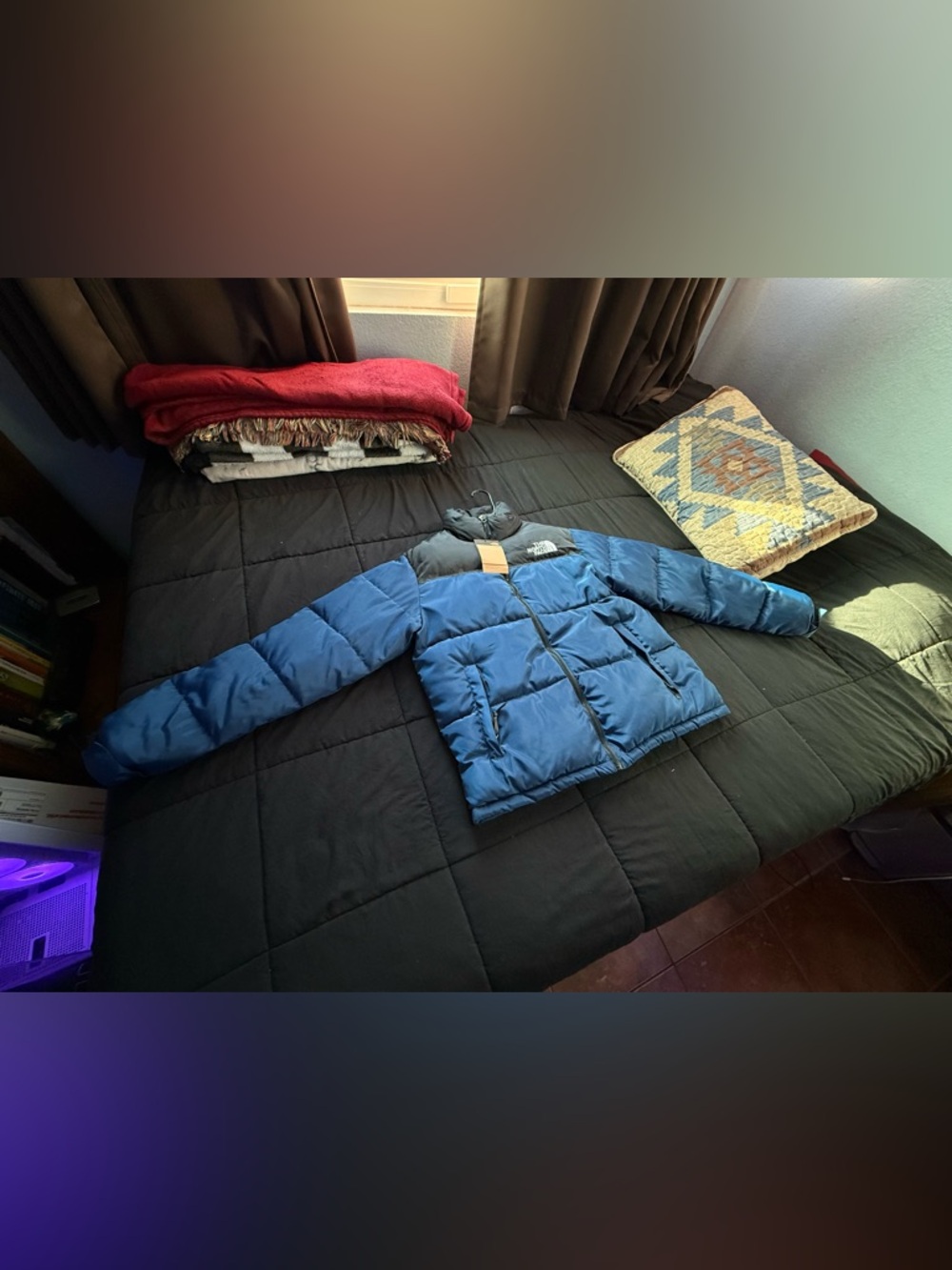 The North Face Blue and Black Puffer Jacket